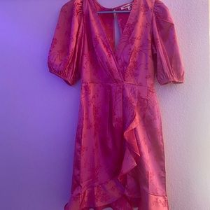 A vibrant hot pink club or party dress